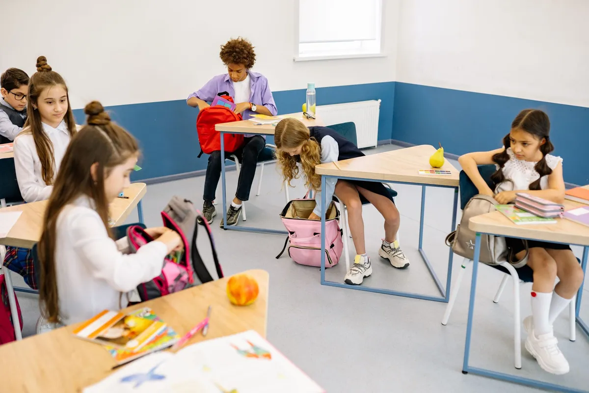 Open school backpack on a desk