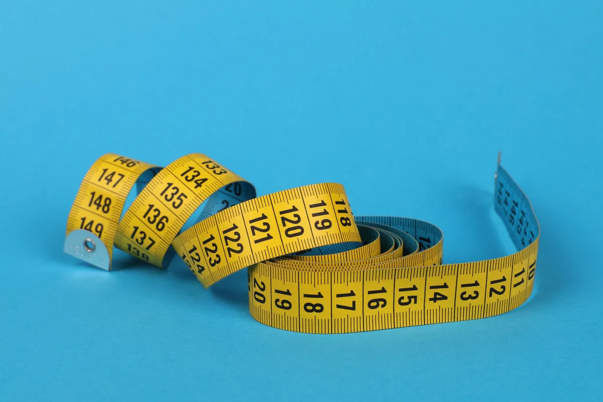 Tape measure lying on a kitchen countertop
