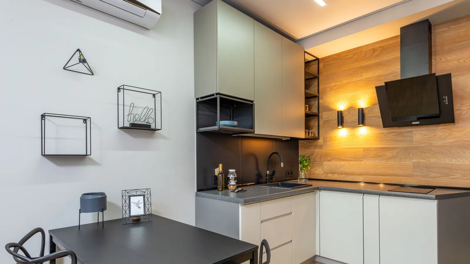 Compact air fryer on a narrow kitchen counter in a small flat