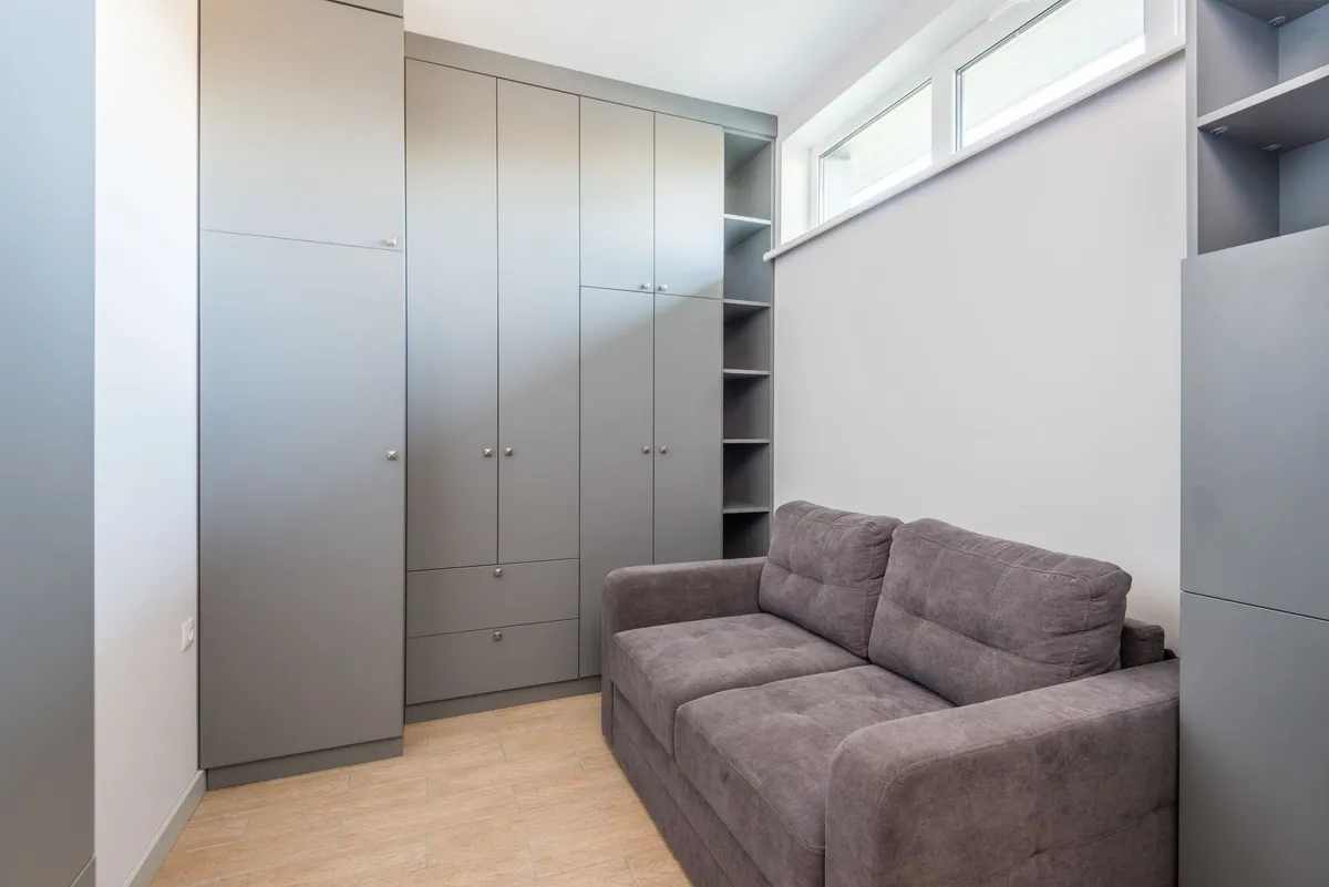 A low sofa in a small flat living room