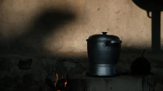 A pot of vegetable soup on the stove, ready to be blended